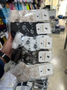 یک جین جوراب مچی گل گلی برجسته توری 10 جفتی در دست