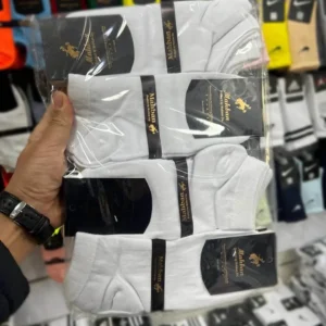 یک جین جوراب مچی ساده سفید 12 جفتی در دست